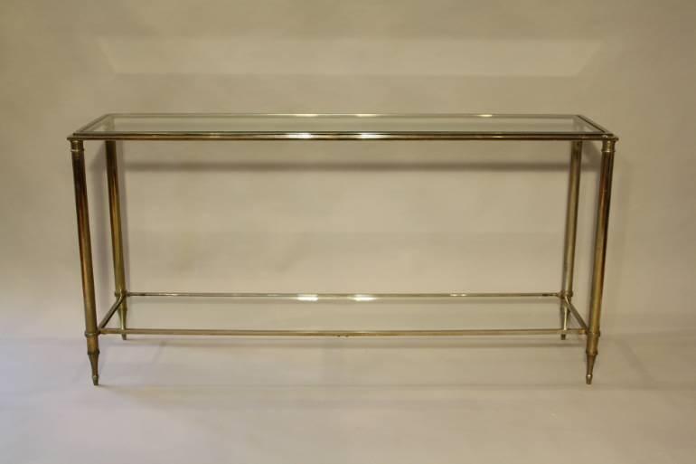 A silver and gold metal two tier console, French c1970