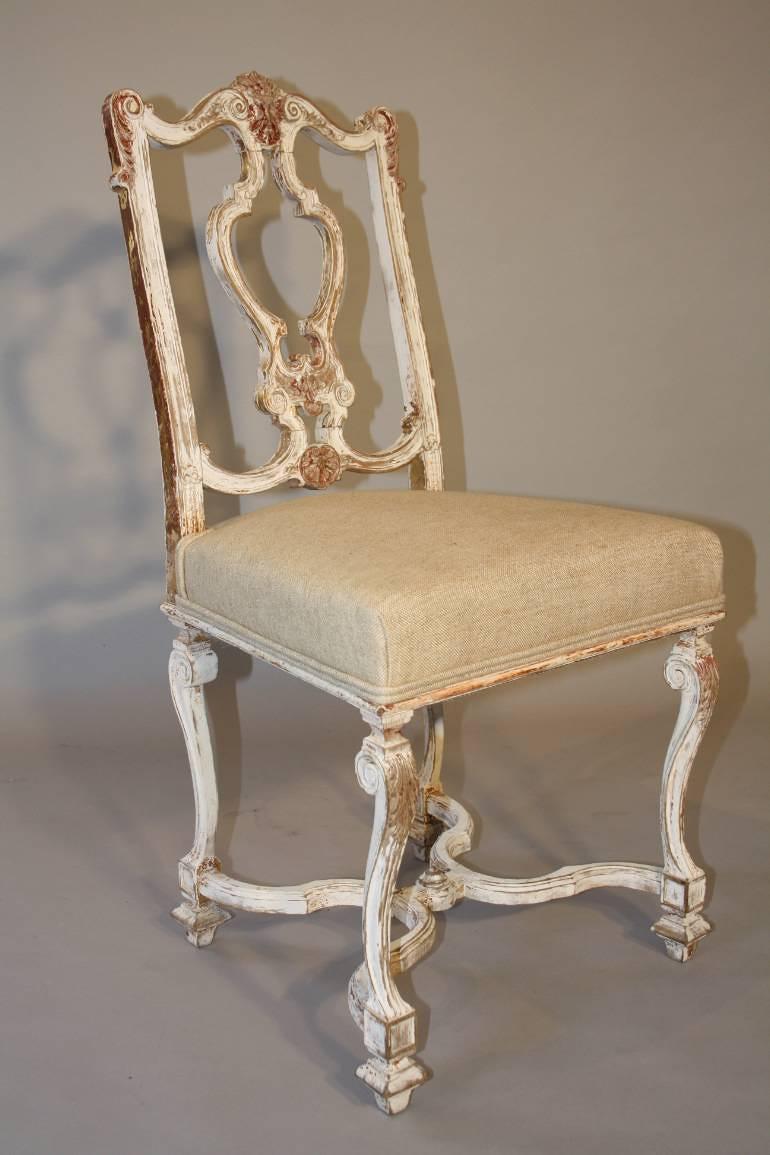 Italian gesso chair with carved masked detail.