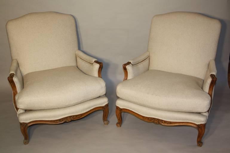 A pair of French Walnut armchairs