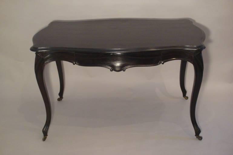 An elegant ebonised desk/centre table with drawer. French Napoleon III c1890