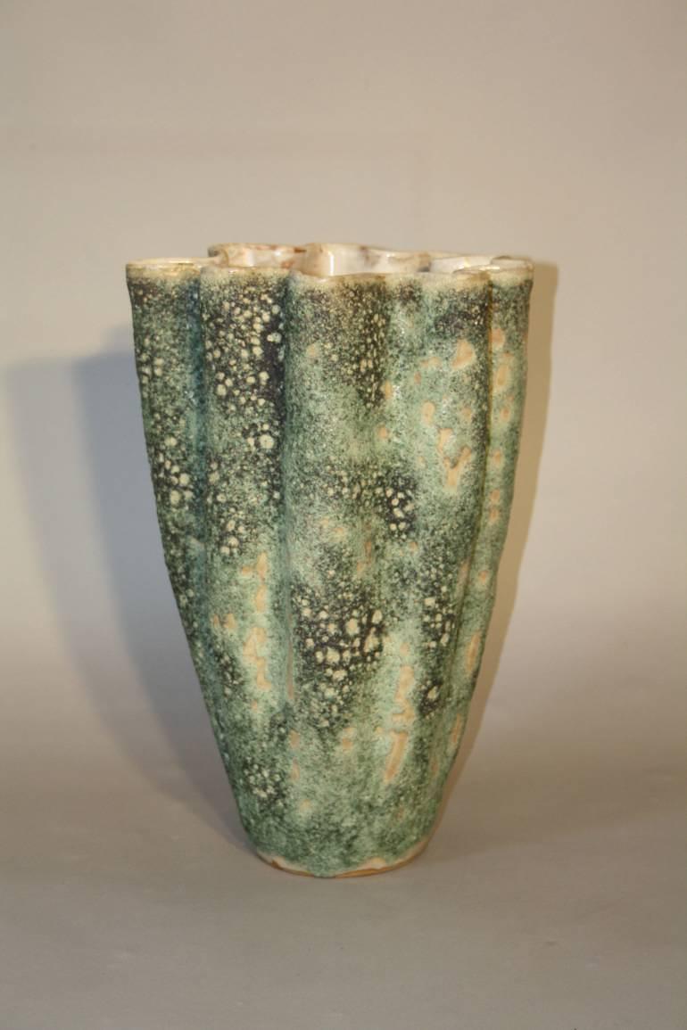A large hand thrown coil glazed terracotta vase, French c1970