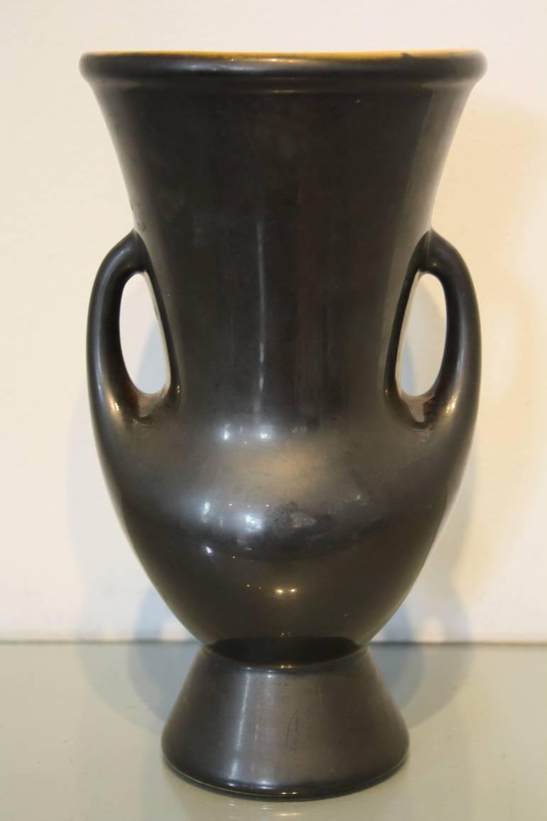 A black opaque Vallauris ceramic vase with orange interior, French c1950