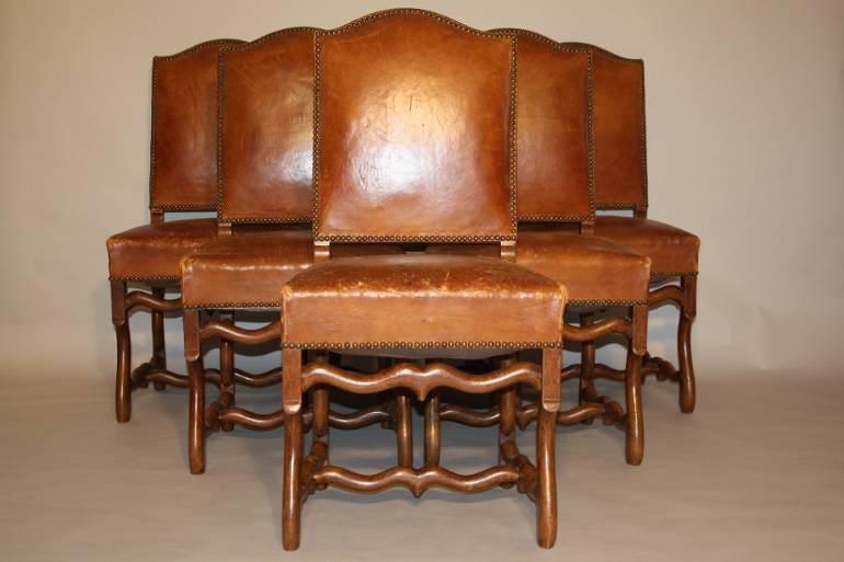 A set of 6 tan leather Os de Mouton dining chairs