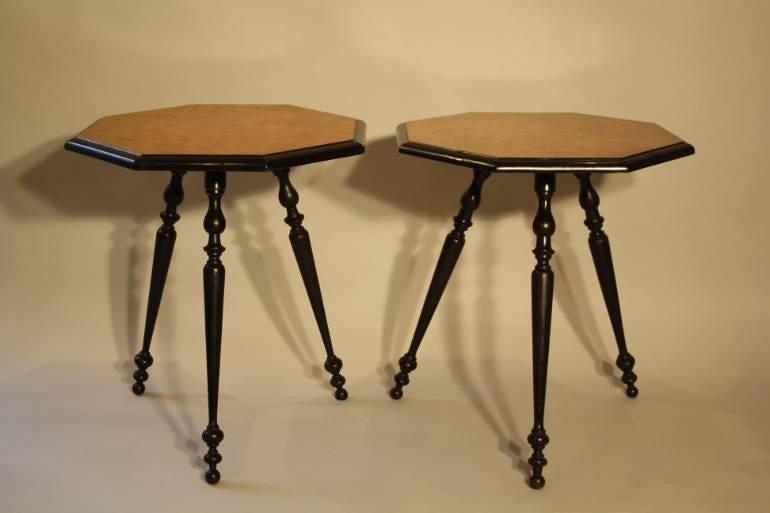 A pair of ebonised and birds eye maple, octagonal tripod tables, c1870