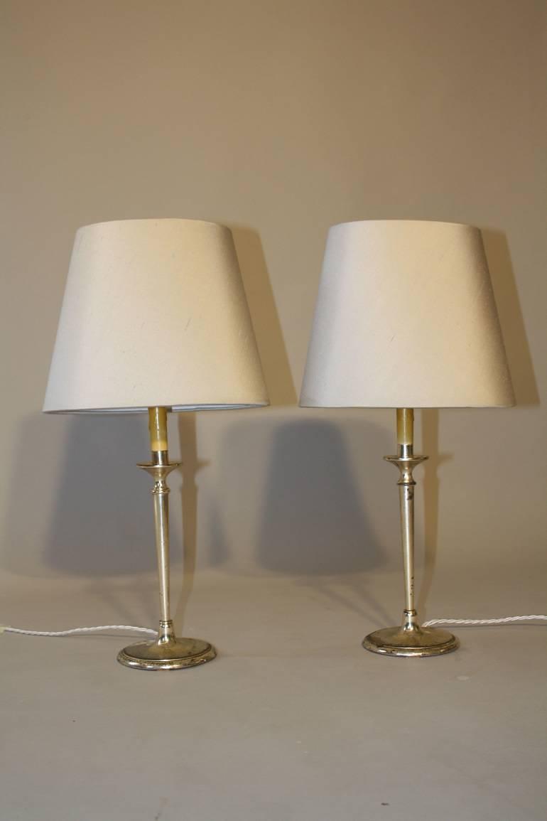 A pair of silver candlestick table lights. French c1950