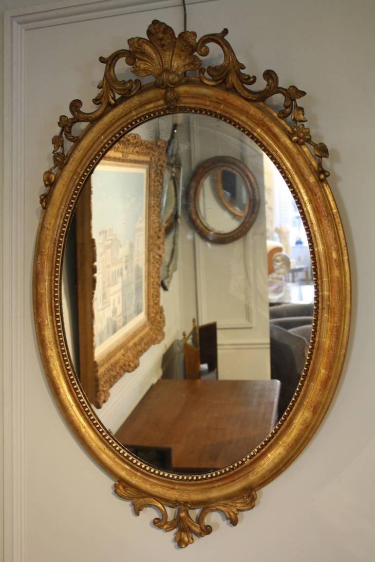 19thC gilt oval mirror