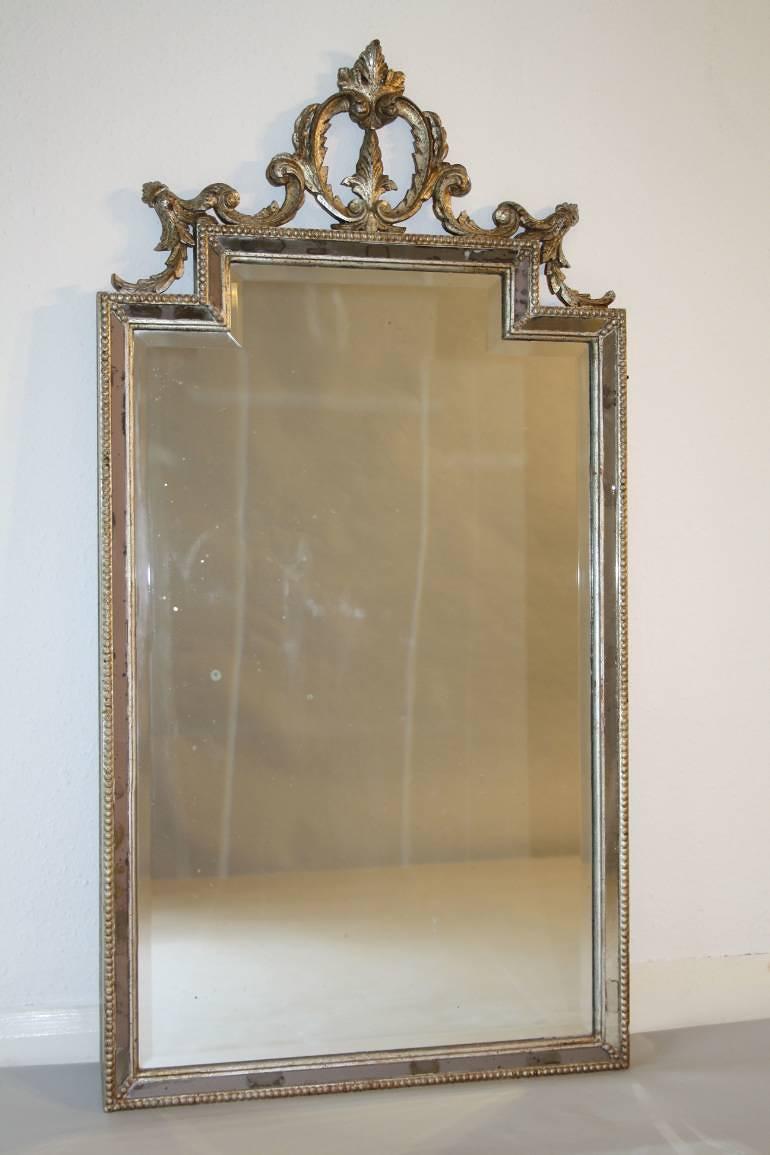 Carved wood silver overmantle mirror