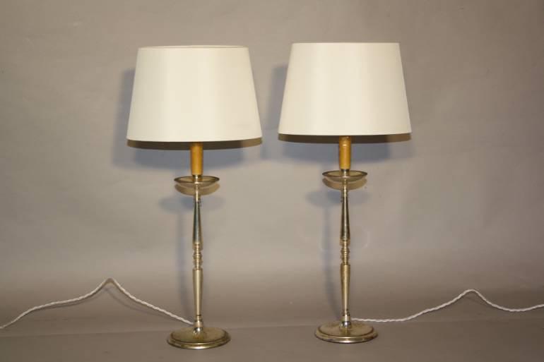 A pair of silver table lamps