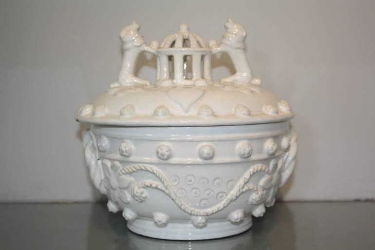A 19thC white glazed ceramic pot with lid
