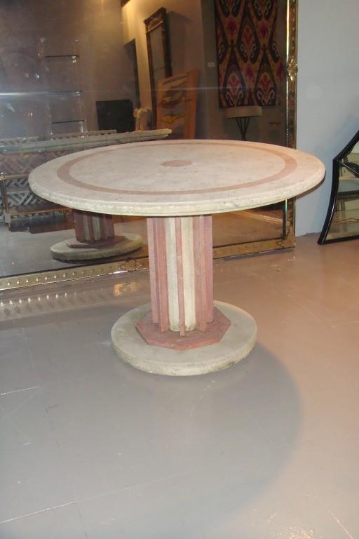 An Art Deco coral stone and red marble outside table. French