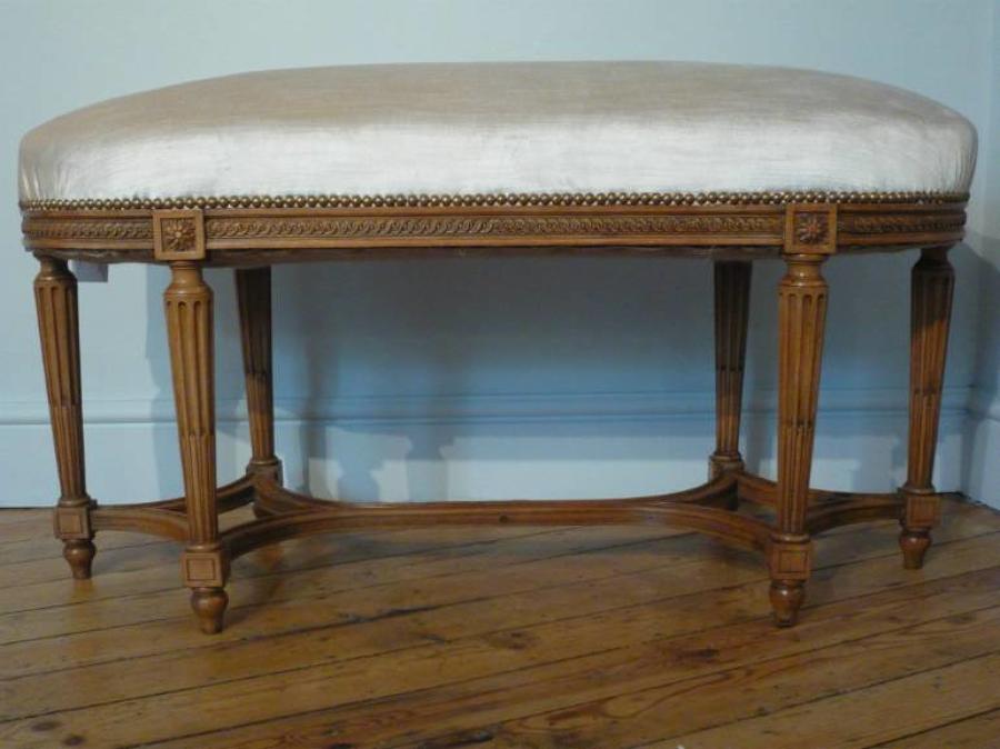 Beautifully carved wood Louis Philippe seat. French. Re upholstered in cream velvet