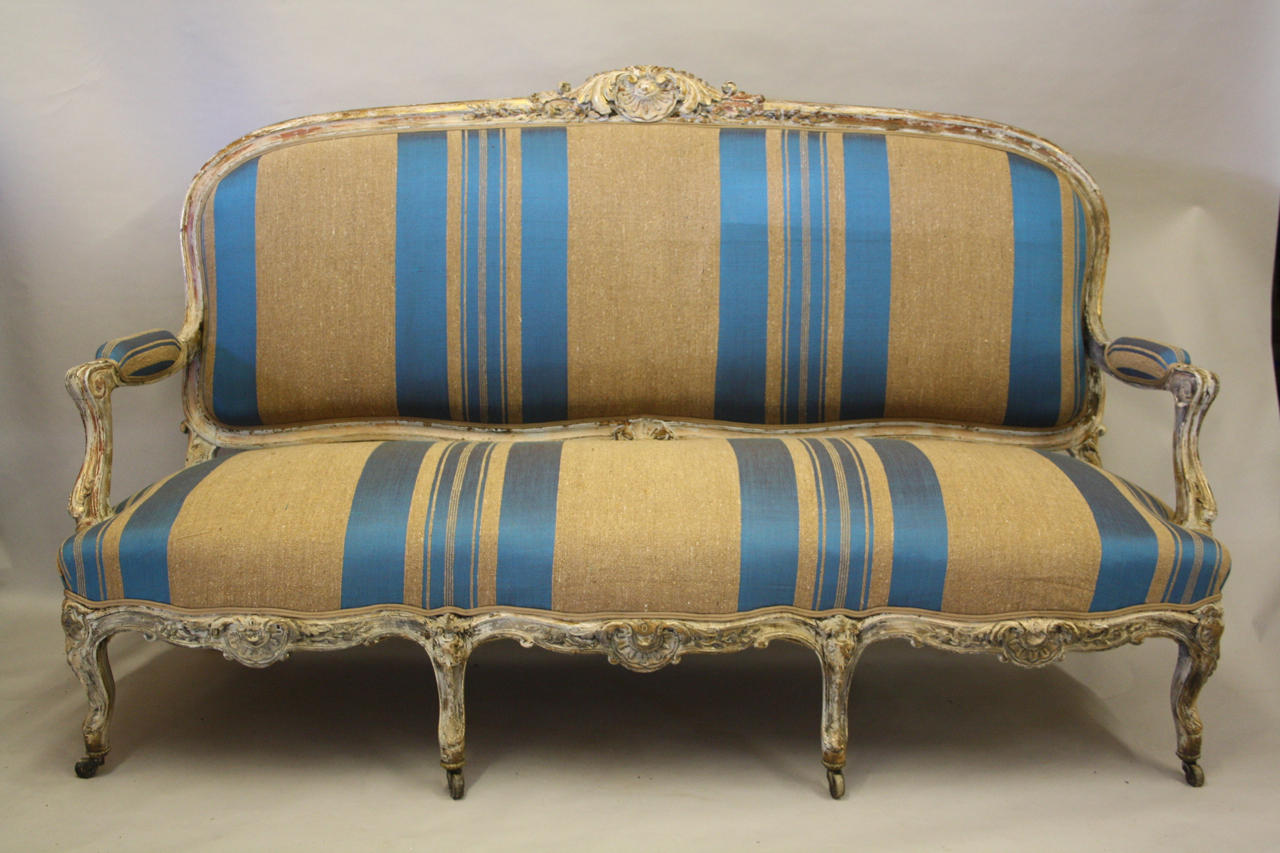 Carved and painted framed Louis XV sofa