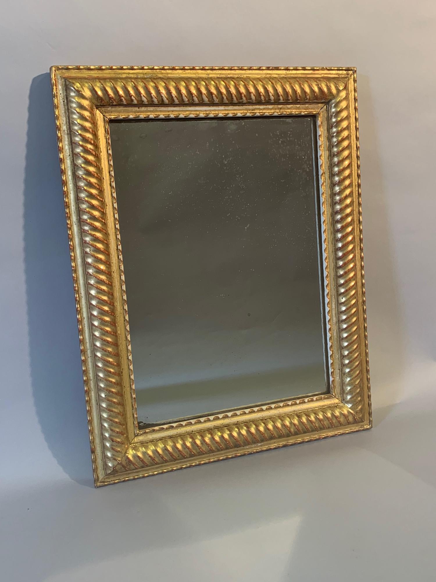 Small French gilt gesso ridge framed mirror.