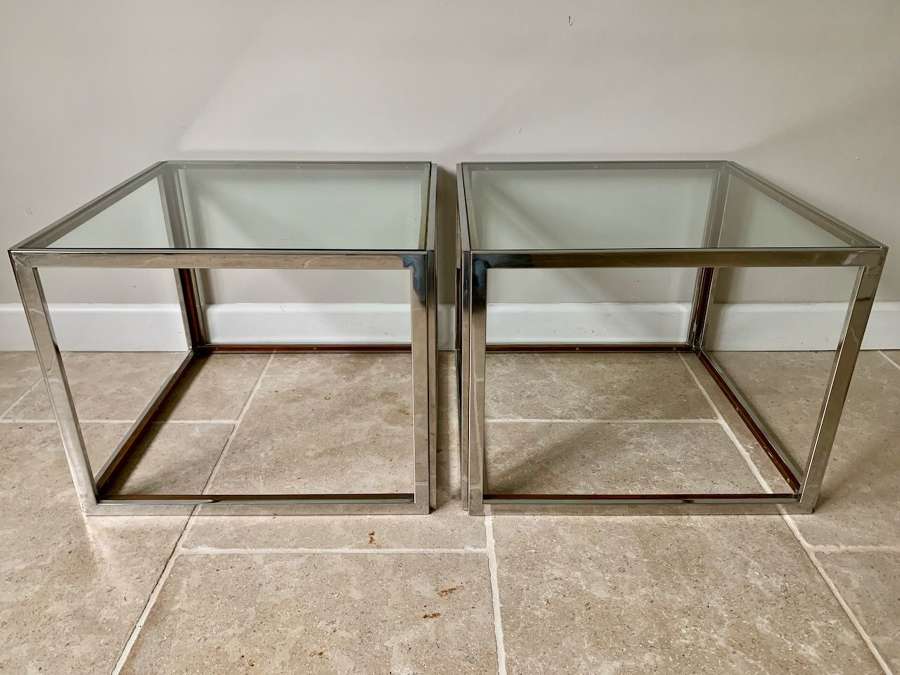 Another pair of silver and gold side tables