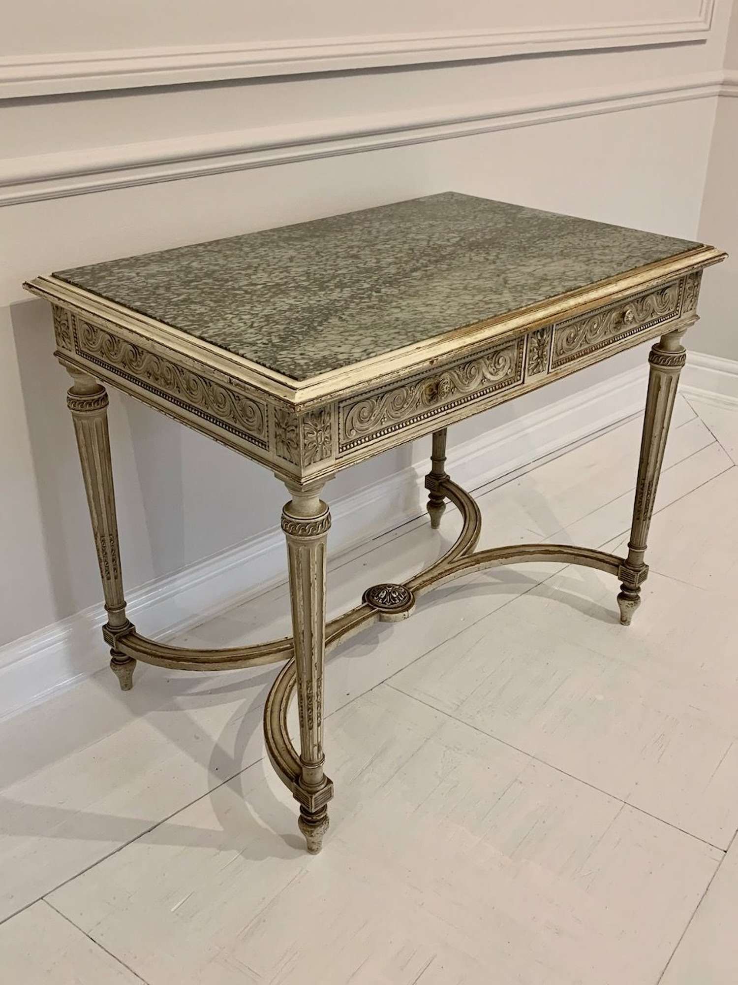 Pretty marble and carved wood table