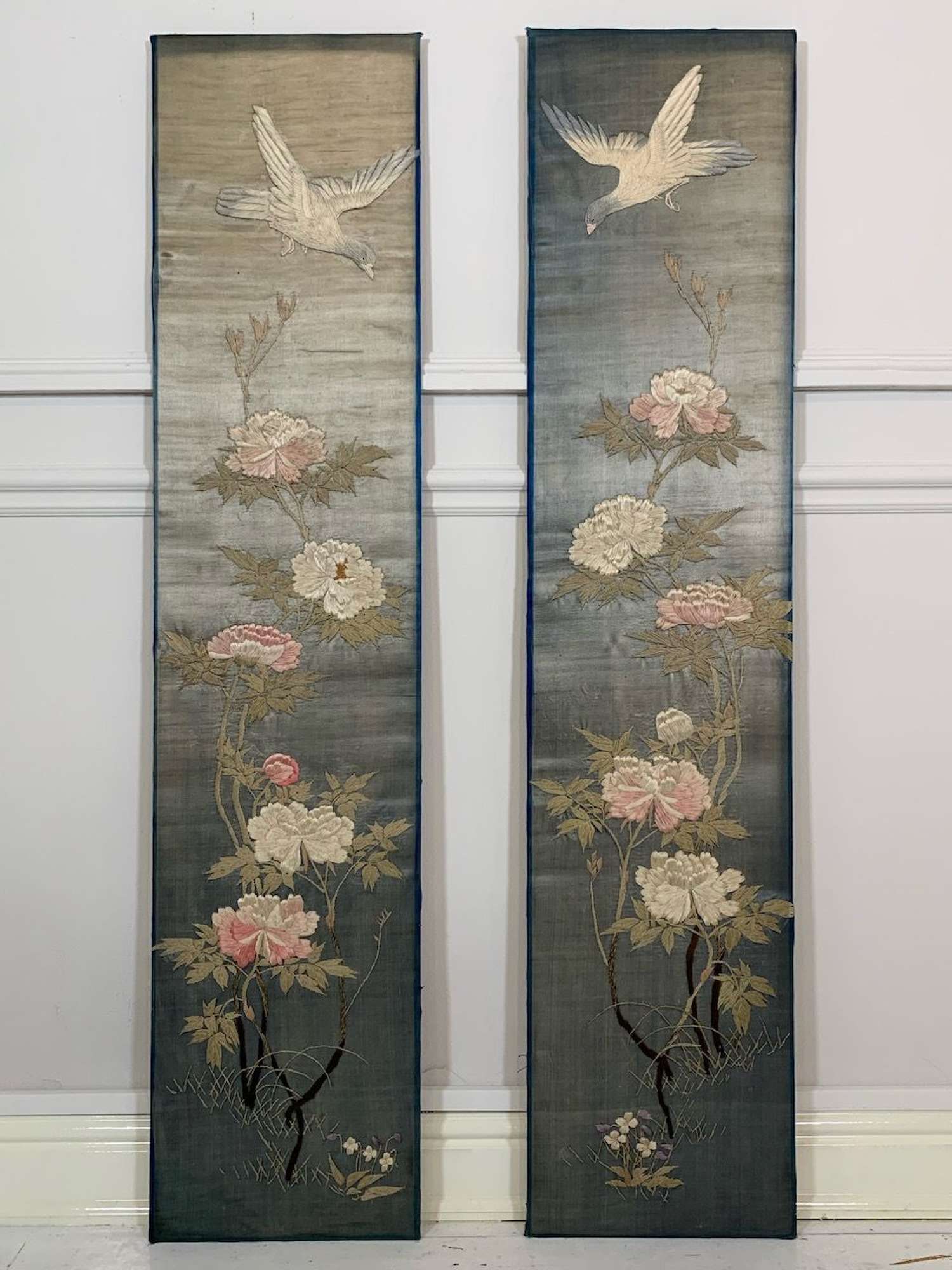 Pair of embroidered panels
