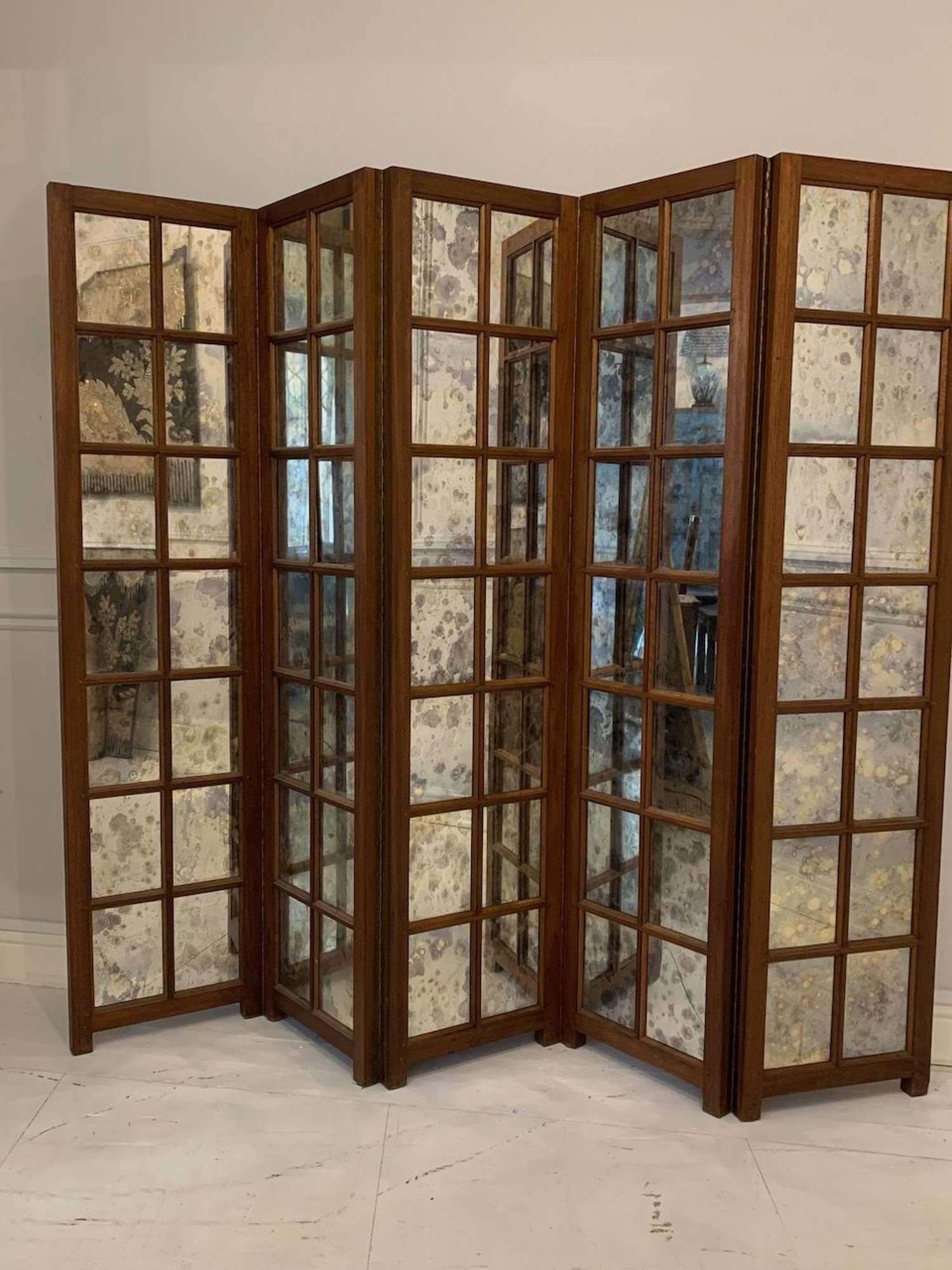 Antiqued mirror glass screen